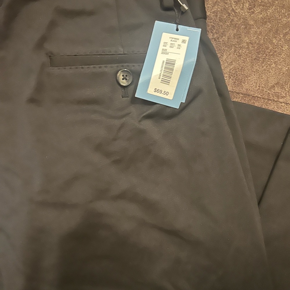 Size 32x34 dress pants!! NEVER BEEN WORN